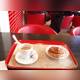 Кофе и булочка с корицей в Aroma Espresso Bar