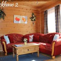 Der-Fuchsbau-Blockhaus-2-Hunde-willkommen