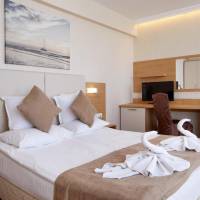 Junior Suite with Sea View (2 Adults + 2 Children)