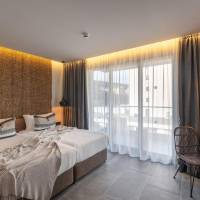 Suite with Side Sea View (2 Adults + 2 Children) – Free Private Beach Access