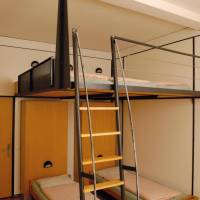 Single Bed in Dormitory Room