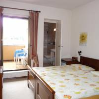 Double or Twin Room with Balcony and Garden View