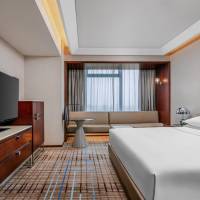 Package room-(Free upgrade to Deluxe King or Twin room * 1 night, including Tom's World Voucher 115 coins & mini KTV/Car driving/Training driving 3 chosse 1, late check out till 16:00 pm)