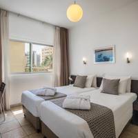 One-Bedroom Apartment with Side Sea View