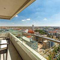 Deluxe Suite, 1 Bedroom Suite, 1 King, City view, Balcony