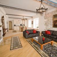 Historical Three-Bedroom Apartment with Sauna and Fireplace
