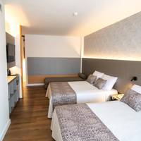 Quadruple Room with Pool View (2 Adults + 2 Children)