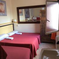 Quadruple Room with Shared Bathroom