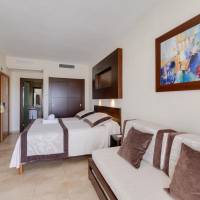 Quadruple Room (2 Adults + 2 Children)
