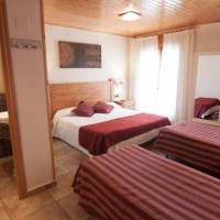 Quadruple Room (2 Adults + 2 Children)