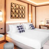 Guest Room with Twin Beds and City View