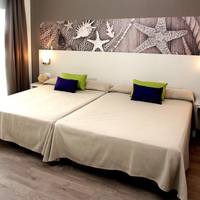 Quadruple Room (2 Adults + 2 Children)