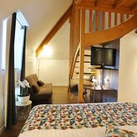 Family Room with 1 Double and 2 Twin Beds and Kitchen