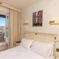 Terrace room with citadel and sea view