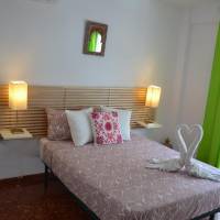 One-Bedroom Apartment with Balcony and City View