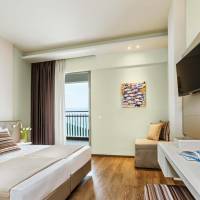 Double or Twin Room with Side Sea View (2 Adults)
