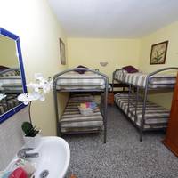 Quadruple Room with Shared Bathroom