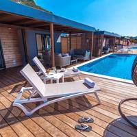 Premium family two-bedroom camping villa with sea view terrace and swimming pool 