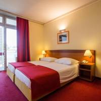 Twin Room with Balcony and Courtyard View
