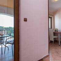 One-Bedroom Apartment with Balcony and Sea View