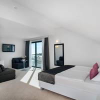 Luxury Suite with Side Sea View and Balcony