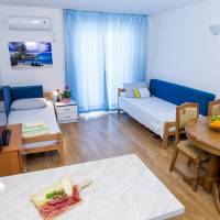 One-Bedroom Apartment with Balcony and Sea View