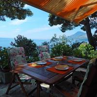One-Bedroom Apartment with Patio and Sea View