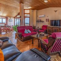 Three-Bedroom Apartment with Balcony and Sea View