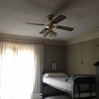 Bed in 6-Bed Dormitory Room with Shared Bathroom