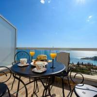 Duplex Three-Bedroom Apartment with Balcony and Sea View