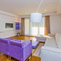 Deluxe Three-Bedroom Apartment with Terrace and Partial Sea View