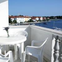 One-Bedroom Apartment with Balcony and Sea View