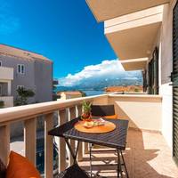 One-Bedroom Apartment with Balcony and Sea View