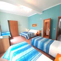 Quadruple Room with Private Bathroom