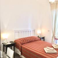 Queen Room with Shared Bathroom