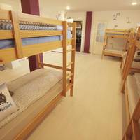 Bed in 12-Bed Dormitory Room with Private Bathroom