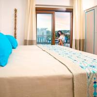 Junior Suite with Balcony and Pool View