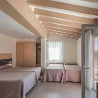 Quadruple Room (3 Adults + 1 children)