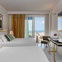 Deluxe Family Room with Sea View and Spa Access