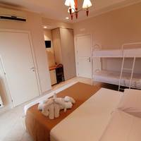 Quadruple Room with Balcony and Garden View