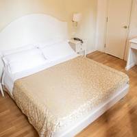 Queen Room with Shared Bathroom
