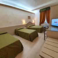 Quadruple Room with Single Beds