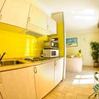 One-Bedroom Apartment with Balcony and Pool View