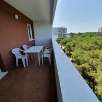 One-Bedroom Apartment with Balcony and Lateral Sea View