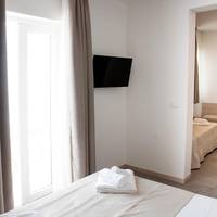 Deluxe Triple Room with Balcony and Sea View