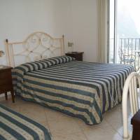 Triple Room with Balcony and Sea View