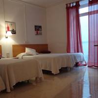 Quadruple Room with Shared Bathroom