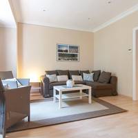 Three-Bedroom Apartment with Balcony - 1,3
