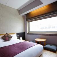 Japanese style single room with small double bed on wooden floor - Non-Smoking