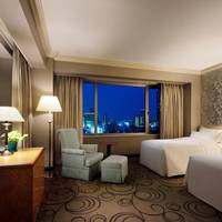 Cornersuite 2-Single beds, Larger Guest room, City view